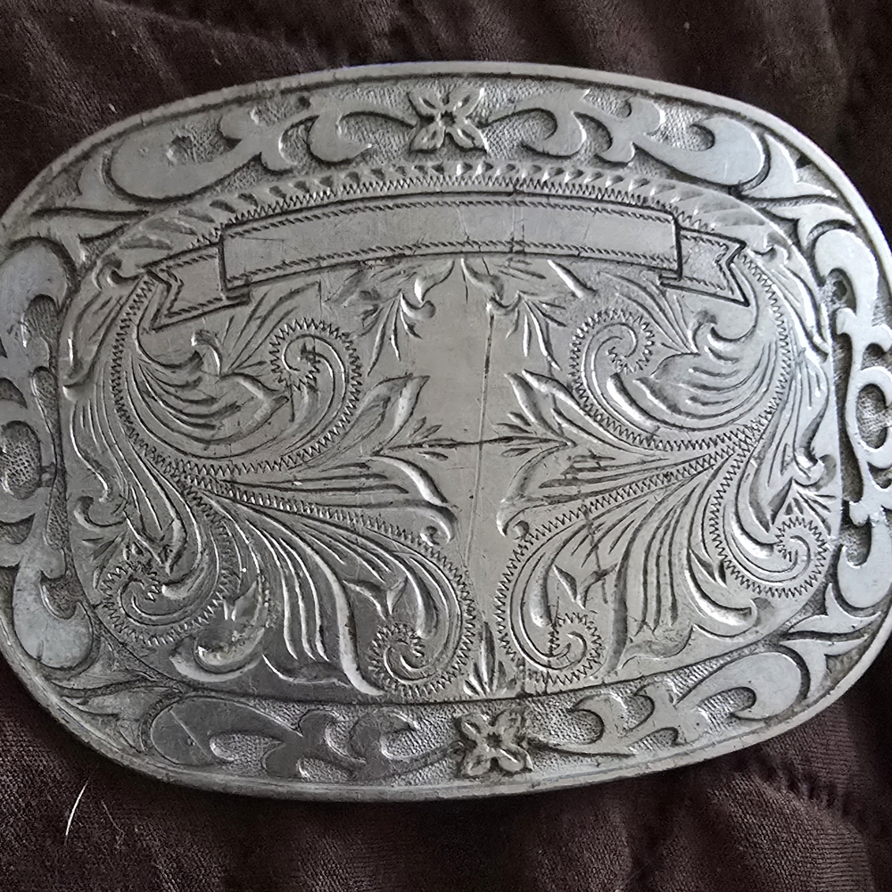 Intricately Engraved Silver Belt Buckle
